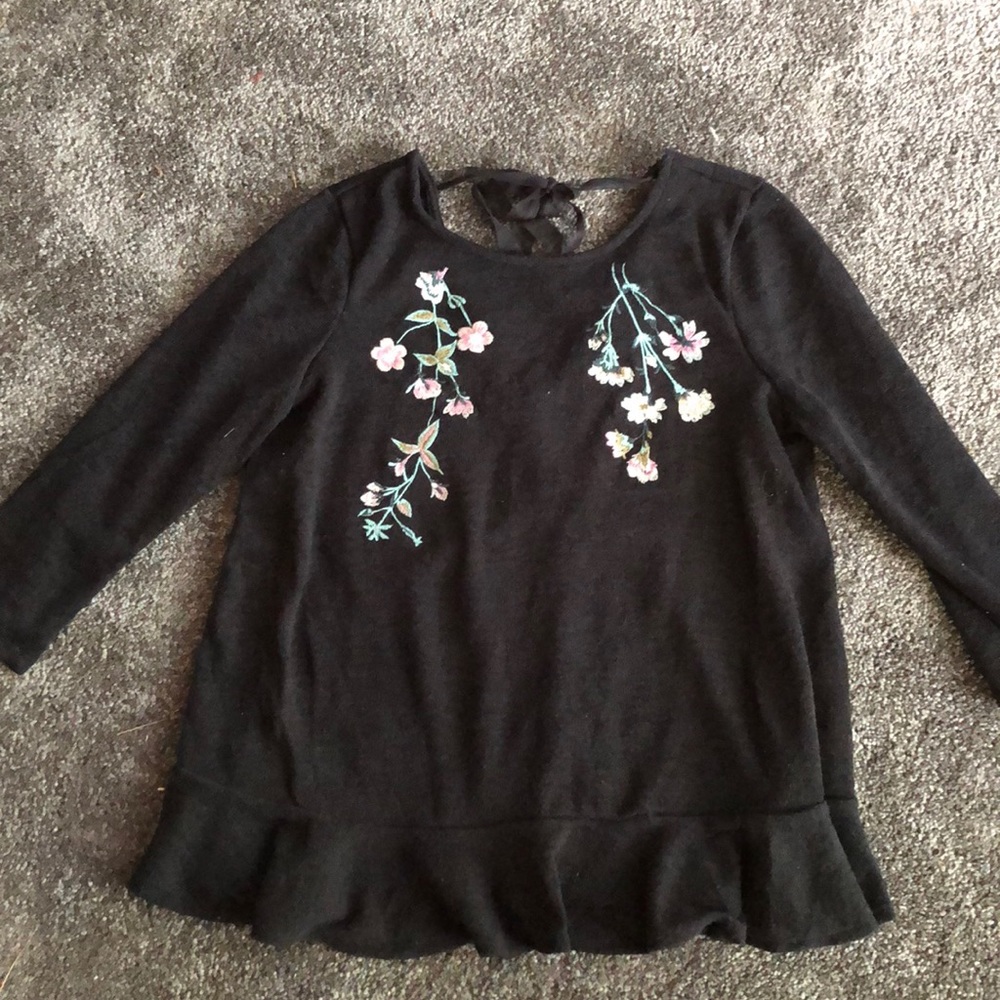 Embroidered peplum top